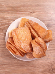 flaky biscuits with sugar on a plate