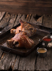 Roasted pork knuckle with mustard and spices