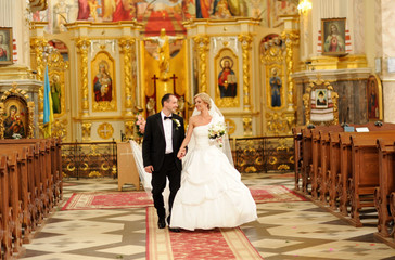 bride and groom in the church