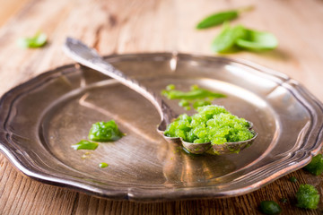 Sorrel granita in metal spoon. 