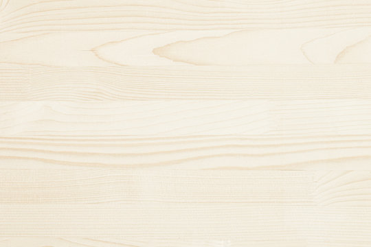Fototapeta The light beige parquet. The wood texture. The background. The horizontal plank.
