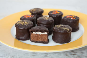 Chocolate candy with topping
