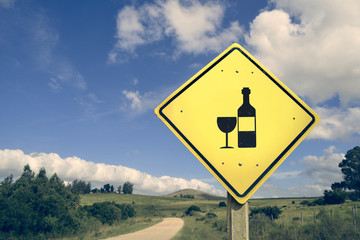 Retro wine bottle road sign with nature landscape - 107797416