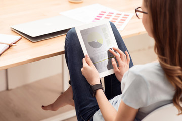 Nice girl sitting at the table