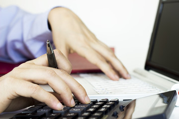 Businesswoman working on computer in the office