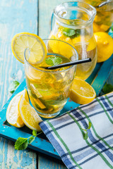 Lemon ice tea served on wooden table