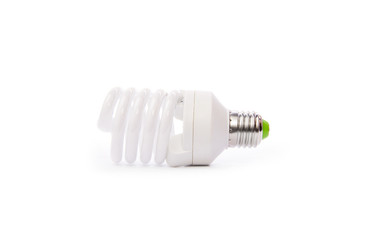 Energy saving fluorescent light bulb on white bakground
