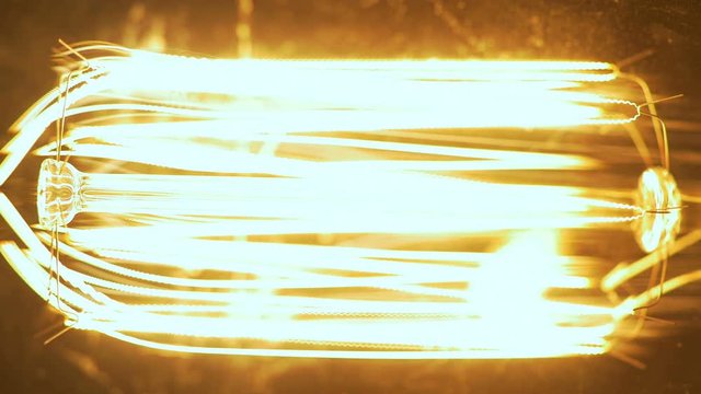 Vintage Light Bulb Turns On And Off Side View 4k