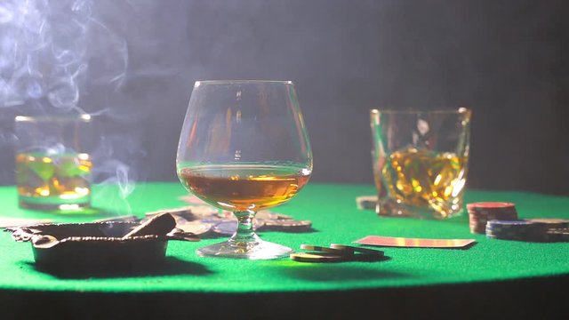 Distribution of cards in poker in a smoky room
