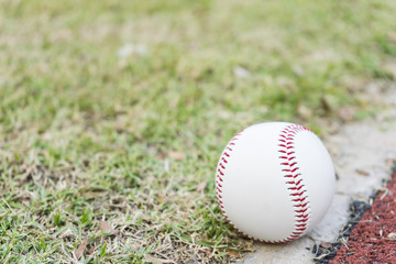 close-up baseball on the infield chalk line