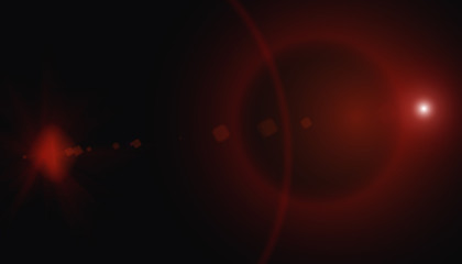 digital lens flare in black background horizontal frame warm