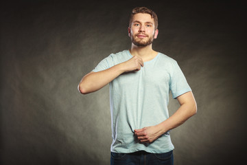 Man guy in blank shirt with empty copy space.