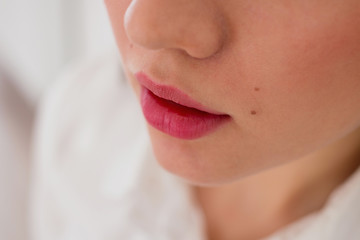 Close up photo of a womens mouth