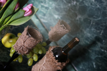 wine bottle green grape on background