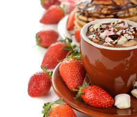 Hot chocolate with marshmallows and strawberries