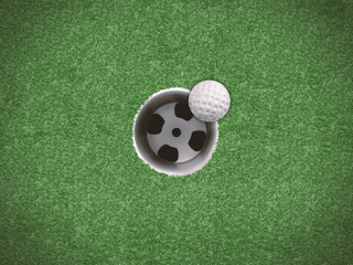 golf ball on the edge of golf cup