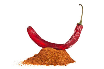 Red pepper with its powder on a white background