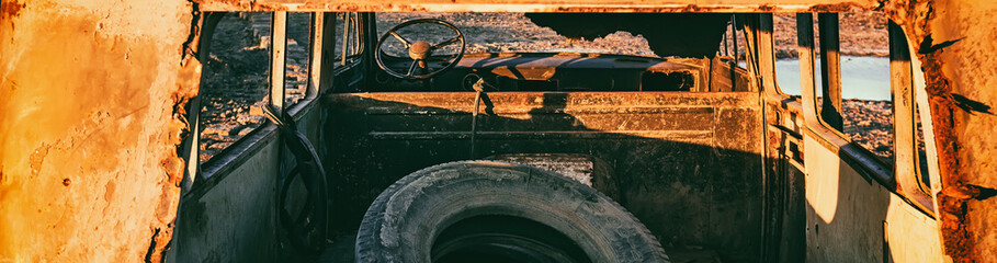 Abandoned rusty car