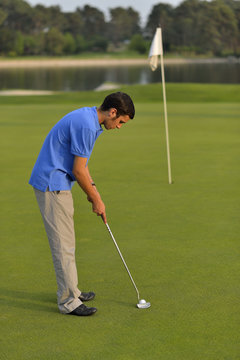 Man playing golf