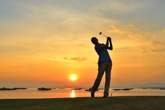Golfer Playing Off the Tee Box