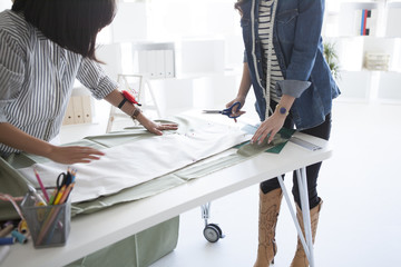 Female pattern makers have made the clothes in studio