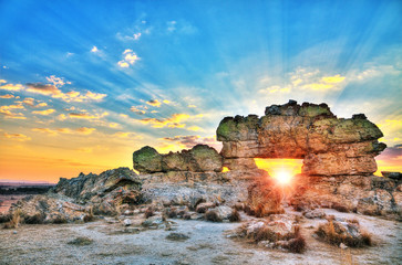 Sunset at the famous rock formation 'La Fenetre' near Isalo, Madagascar. HDR