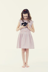Child with photo camera