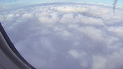 Aerial view flying above the clouds