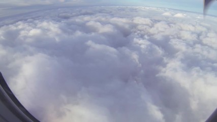 Aerial view flying above the clouds
