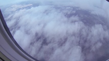 Aerial view flying above the clouds