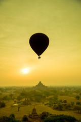 Silhouette balloon over a pagoda field in an ancient city on the sunrise, Myanmar