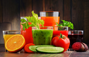 Glasses with fresh organic vegetable and fruit juices