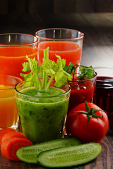 Glasses with fresh organic vegetable and fruit juices