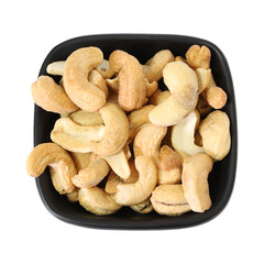 Cashew nuts in the black bowl