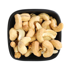 Cashew nuts in the black bowl