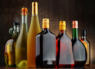 Fototapeta na wymiar Bottles of assorted alcoholic beverages