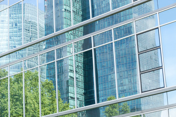 Facade of office building with window reflection