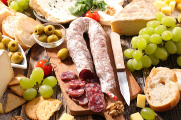 composition of salami, bread and cheese