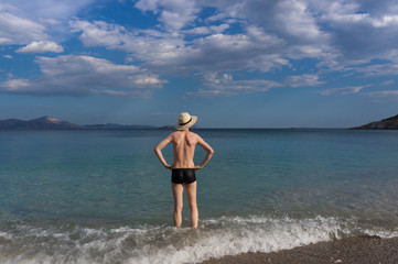 Happy vacationer at the sea