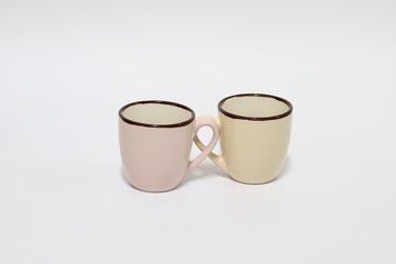 Closed up two cups isolated on white background