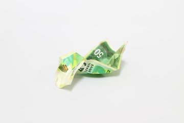 Crumpled 50 New Sheqel bill on white background. Business concept background