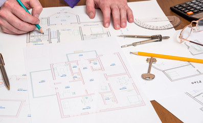 Architect working on blueprint