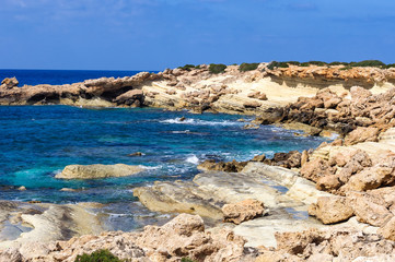 Fototapeta na wymiar The coastline of beautiful beach on Mediterranean Sea. Cyprus