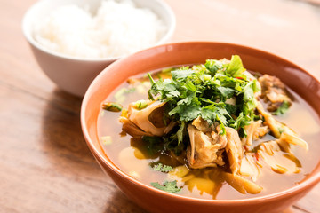 Jackfruit curry , Spicy foods , Rice on wooden floor.