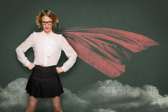 Super woman nerd geek teacher student in blackboard drawing cape successful confident powerful