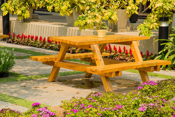 Wooden table in garden.