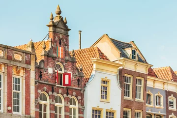 Foto op Canvas Old houses in the Dutch city of Gouda © Martin Bergsma