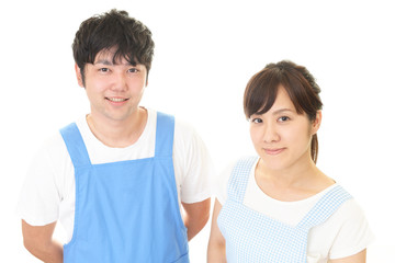 Fototapeta premium エプロンを着た男性と女性