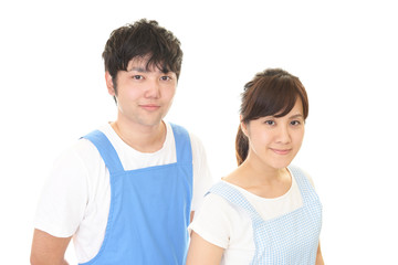 Fototapeta premium エプロンを着た男性と女性