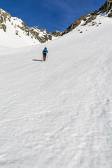 Naklejka na ściany i meble Approach slope on which the arrears frozen snow.